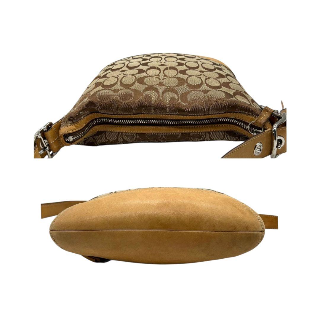 コーチ COACH ショルダーバッグ ブラウン 茶 シグネチャー ホーボー ソフトスリムダッフル 斜め掛け可 ワンショルダー キャンバス レザー 本革 タッセル シルバー金具 ロゴタグ 9362 U9