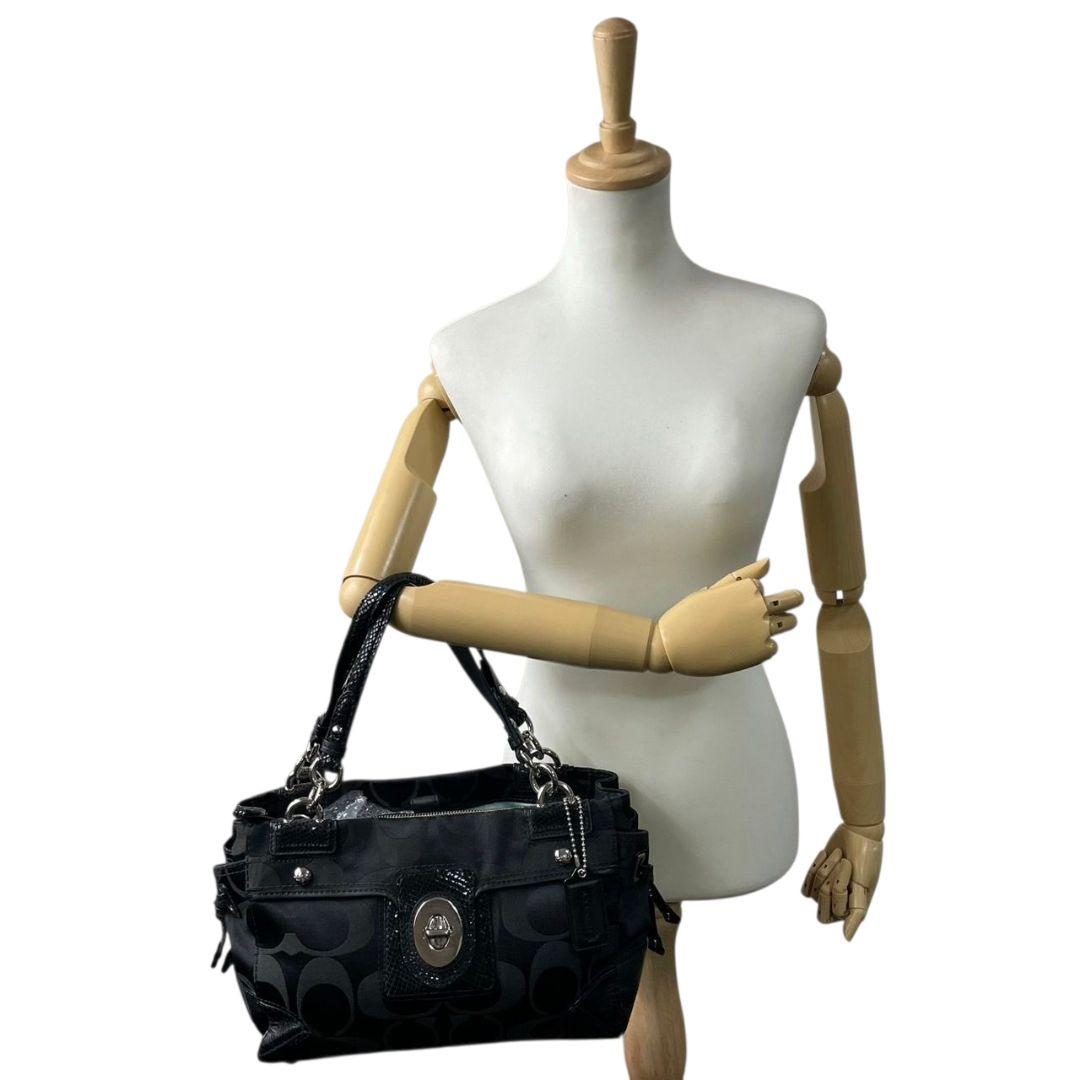 コーチ シグネチャー ワンショルダー ハンドバッグ ブラック レザー キャンバス トートバッグ ターンロック 本革 シルバー金具 ロゴタグ 肩掛け可