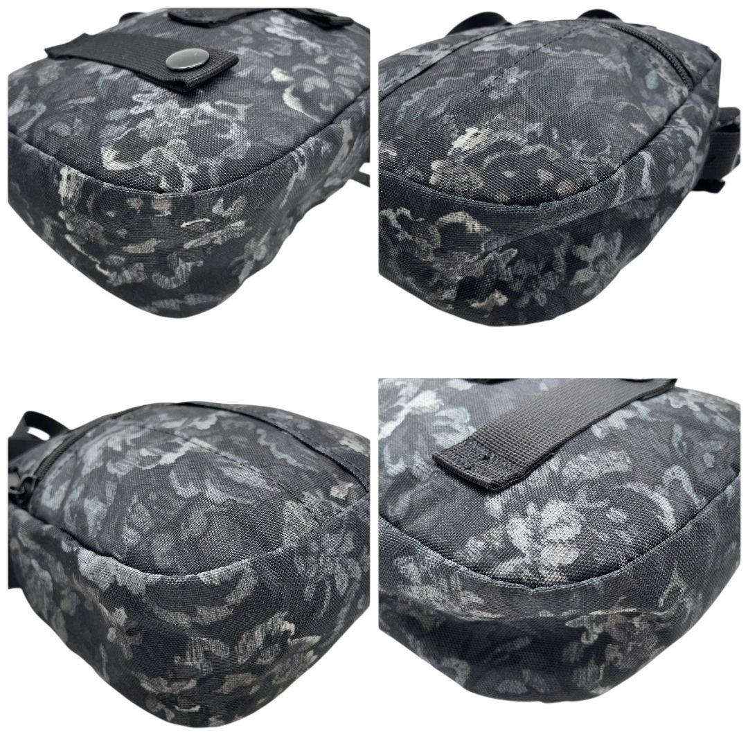 グレゴリー GREGORY ショルダーバッグ ポーチ ブラック 黒 総柄 ロゴタグ キャンバス 斜め掛け可 クロスボディ コンパクト 軽量 u5