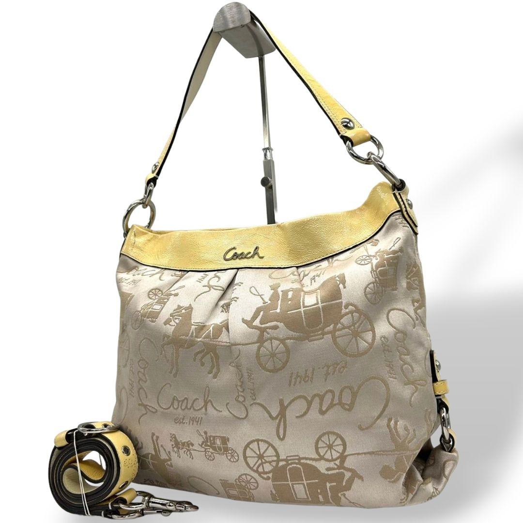 コーチ ショルダーバッグ 黄 イエロー ベージュ 馬車柄 ホースアンドキャリッジ 2way トートバッグ ハンドバッグ 斜め掛け可 ナイロン パテント s63 シルバー金具 COACH F16222