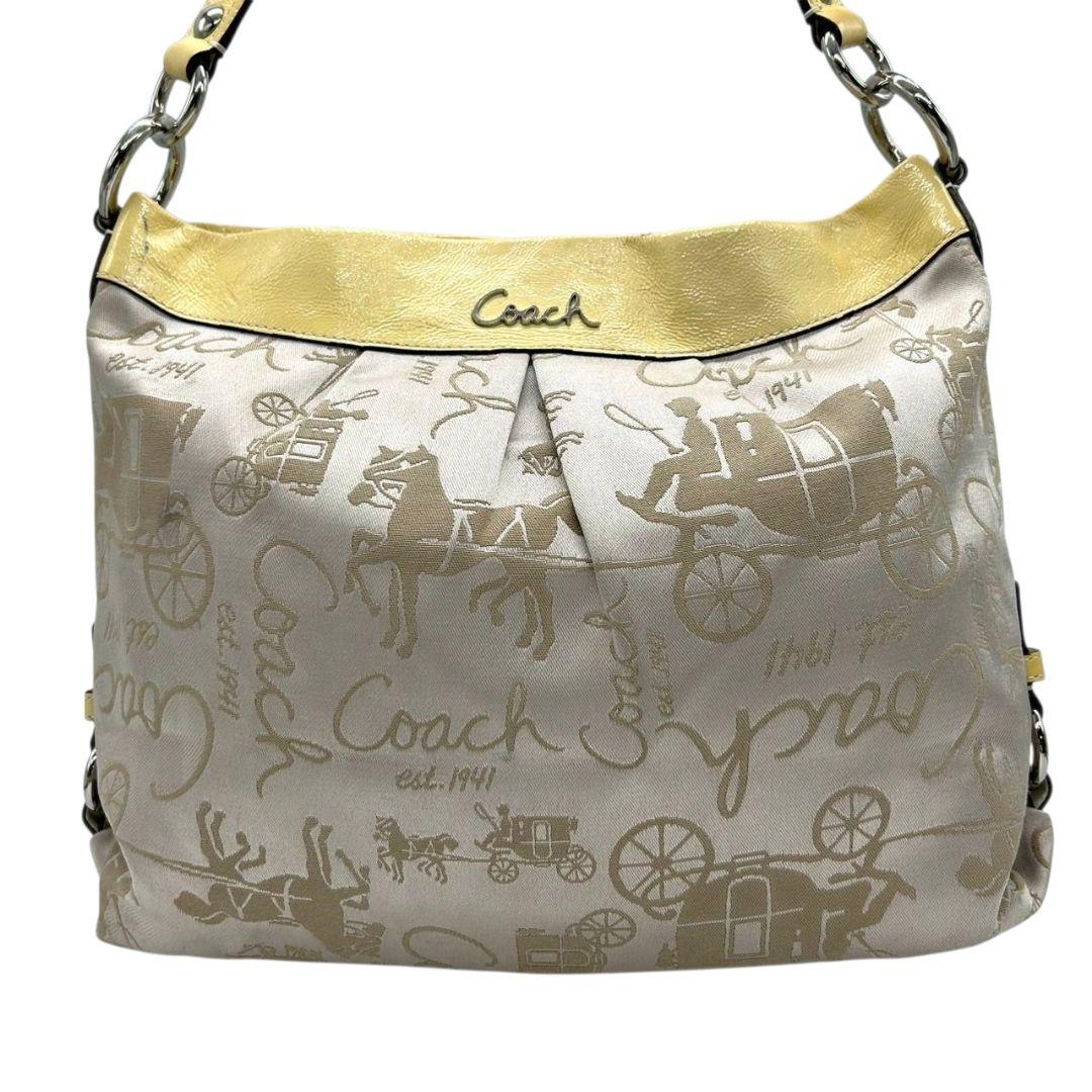 コーチ ショルダーバッグ 黄 イエロー ベージュ 馬車柄 ホースアンドキャリッジ 2way トートバッグ ハンドバッグ 斜め掛け可 ナイロン パテント s63 シルバー金具 COACH F16222