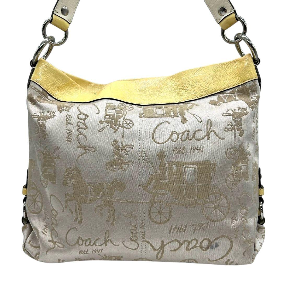 コーチ ショルダーバッグ 黄 イエロー ベージュ 馬車柄 ホースアンドキャリッジ 2way トートバッグ ハンドバッグ 斜め掛け可 ナイロン パテント s63 シルバー金具 COACH F16222