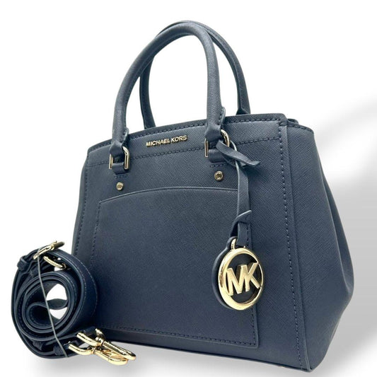 美品　マイケルコース　ハンドバッグ　紺　ロゴ　2way　斜め掛け可　s77　トートバッグ　ショルダーバッグ　自立可　サフィアーノ　PVC　レザー　ゴールド金具　ロゴプレート　チャーム付き　ネイビー　MICHAEL KORS