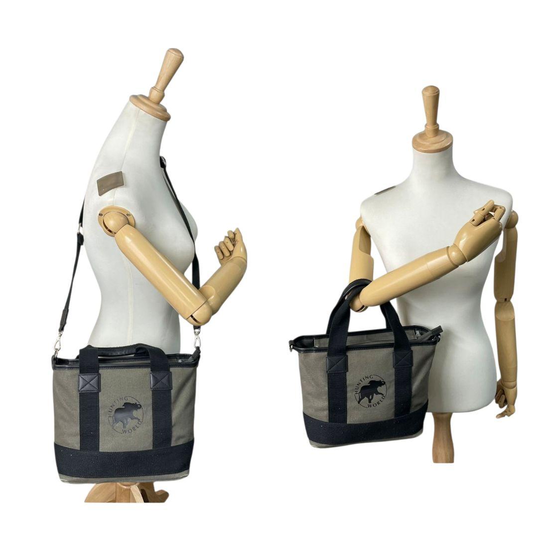 ハンティングワールド トートバッグ カーキ 黒 ブラック デカロゴ 2way キャンバス レザー 本革 ハンドバッグ ショルダーバッグ 斜め掛け可 シルバー金具 高級感 HUNTING WORLD 592403 T1