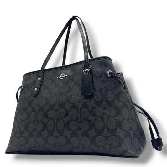 コーチ　トートバッグ　ブラック　シグネチャー　巾着　ワンショルダー　PVC　ハンドバッグ　肩掛け可　肩かけ可　ロゴタグ　シルバー金具　ロゴ　COACH　F57842　オシャレ　本物保証　鑑定済　スピード発送