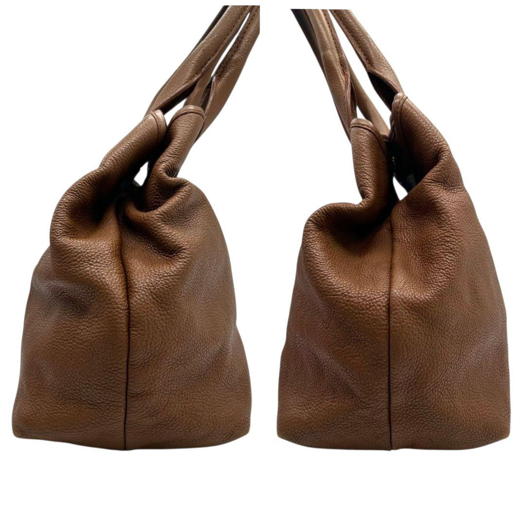 TORY BURCH トリーバーチ トートバッグ ブラウン 茶 デカロゴ パンチング レザー 本革 ワンショルダー ハンドバッグ 肩掛け可 自立可 ゴールド金具 s88 おしゃれ 高級感