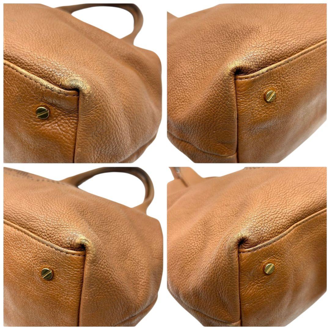 TORY BURCH トリーバーチ トートバッグ ブラウン 茶 デカロゴ パンチング レザー 本革 ワンショルダー ハンドバッグ 肩掛け可 自立可 ゴールド金具 s88 おしゃれ 高級感