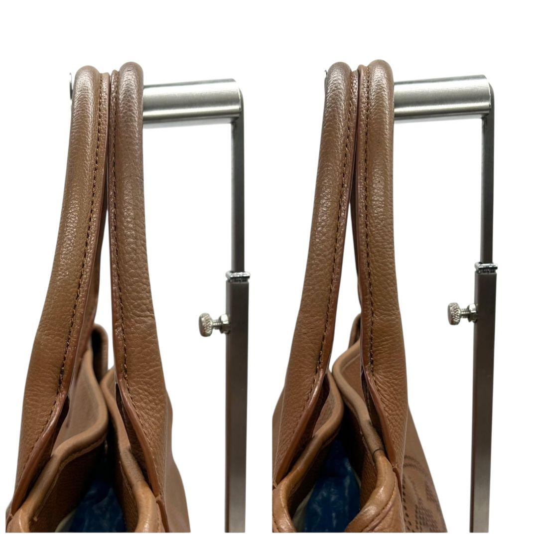 TORY BURCH トリーバーチ トートバッグ ブラウン 茶 デカロゴ パンチング レザー 本革 ワンショルダー ハンドバッグ 肩掛け可 自立可 ゴールド金具 s88 おしゃれ 高級感