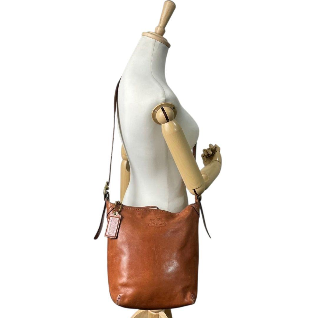 コーチ ショルダーバッグ 茶 ブラウン ホーボー レザー 本革 斜め掛け可 ゴールド金具 ロゴタグ ロゴ トートバッグ ハンドバッグ 高級感 COACH 12376 s16