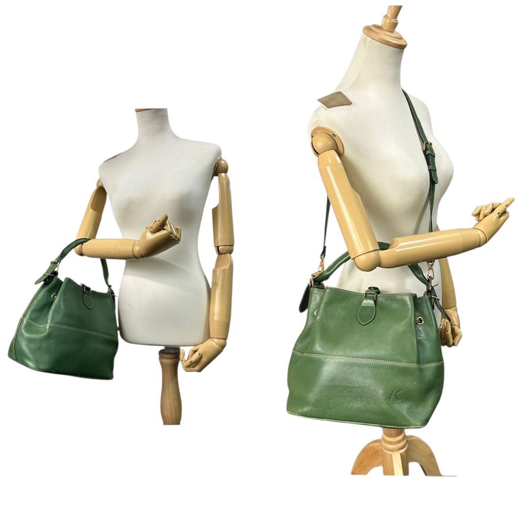 キタムラ Kitamura ハンドバッグ 緑 グリーン 巾着 2way レザー 本革 Kロゴ トートバッグ ショルダーバッグ 斜め掛け可 ゴールド金具 s70 レディース