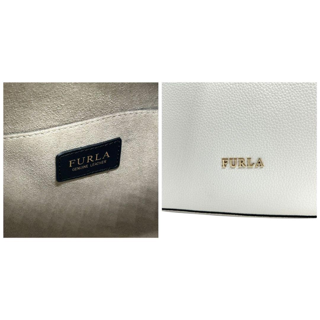 美品 フルラ ショルダーバッグ 白 巾着 レザー 本革 ワンショルダー s9 ハンドバッグ トートバッグ 肩掛け可 肩かけ可 ホワイト ゴールド金具 ロゴ 自立可 FURLA
