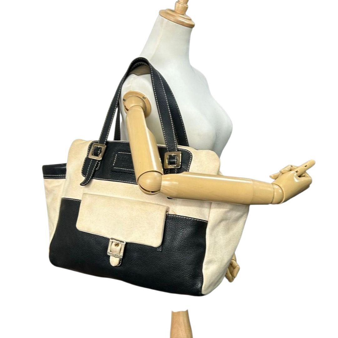 ケイトスペード Kate spade トートバッグ 黒 白 バイカラー A4収納 ワンショルダー ハンドバッグ ブラック ホワイト シルバー金具 肩掛け可 レザー 本革 キャンバス s70 レディース