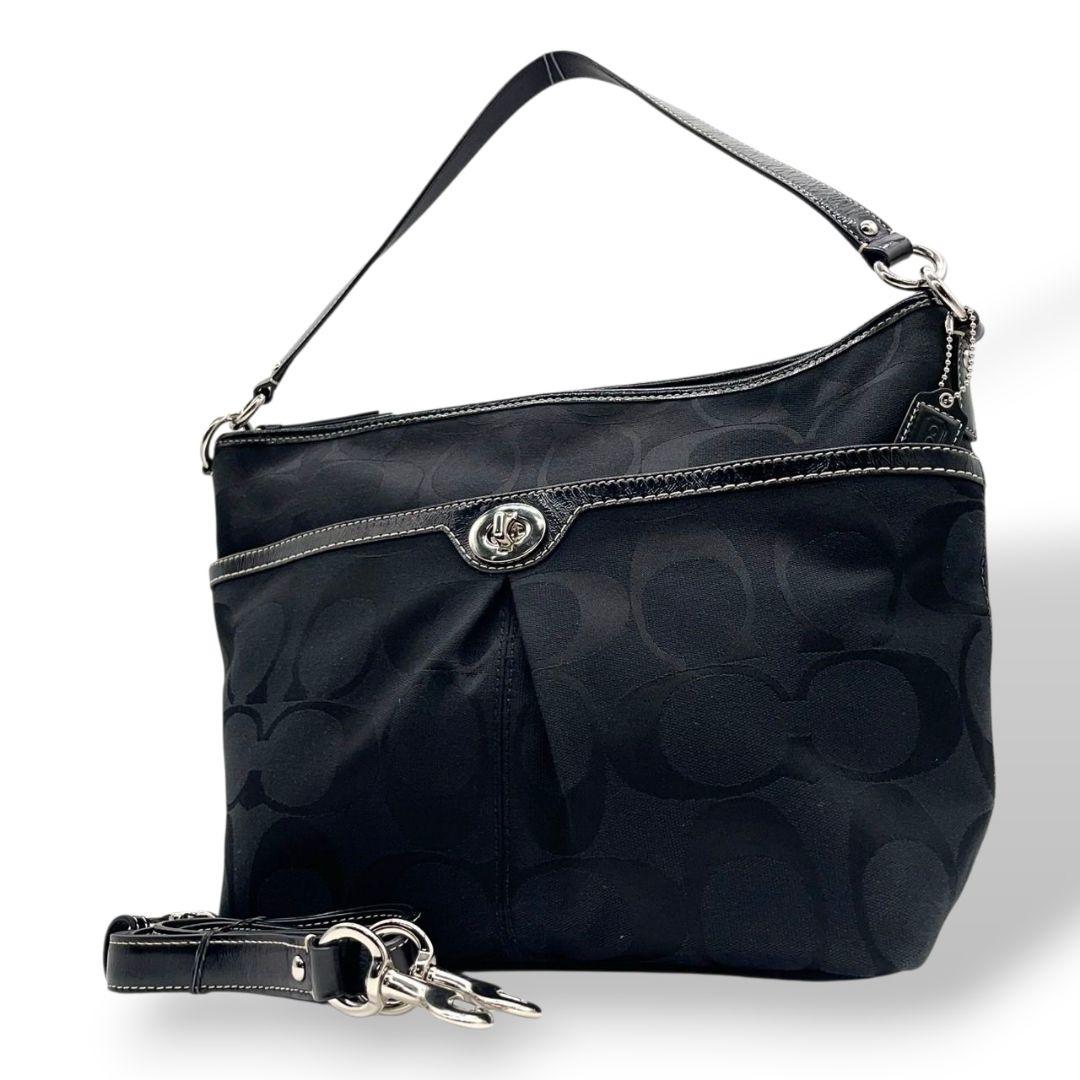 コーチ ショルダーバッグ 黒 ブラック シグネチャー ターンロック 2way ハンドバッグ トートバッグ ワンショルダー 斜め掛け可 キャンバス シルバー金具 ロゴタグ COACH F14852
