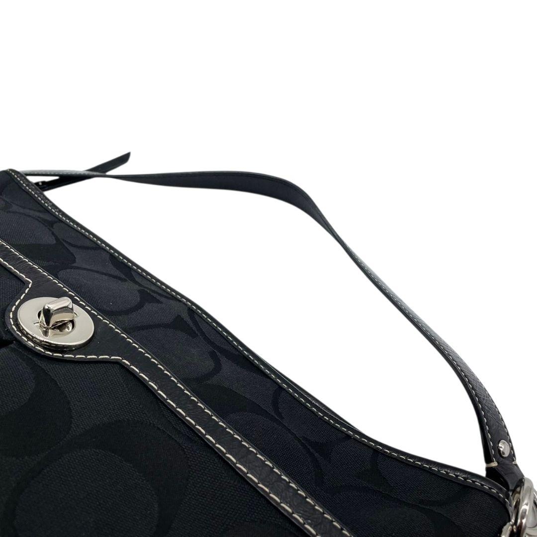 コーチ ショルダーバッグ 黒 ブラック シグネチャー ターンロック 2way ハンドバッグ トートバッグ ワンショルダー 斜め掛け可 キャンバス シルバー金具 ロゴタグ COACH F14852