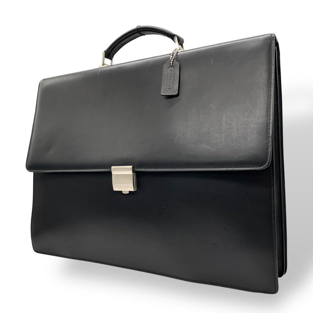 コーチ ビジネスバッグ レザー ブラック A4収納 ブリーフケース フラップ ハンドバッグ トートバッグ 大容量 シルバー金具 チャーム付き COACH E