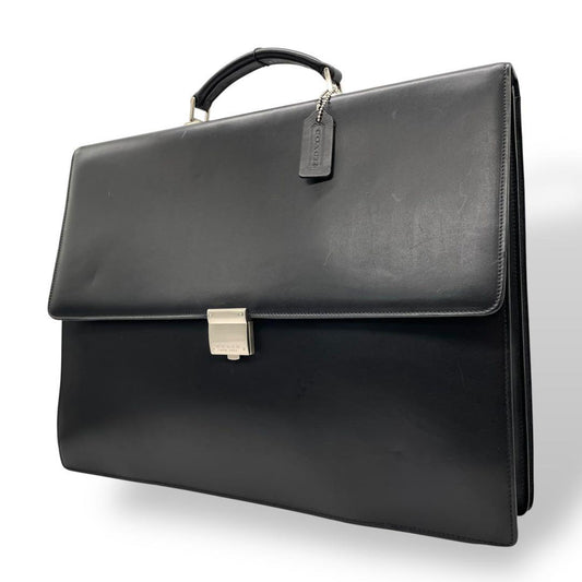 コーチ ビジネスバッグ レザー ブラック A4収納 ブリーフケース フラップ ハンドバッグ トートバッグ 大容量 シルバー金具 チャーム付き COACH E