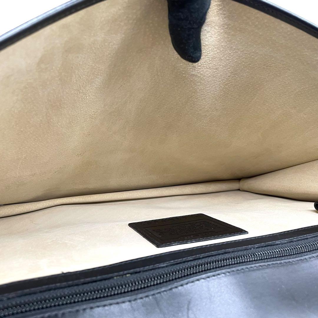 コーチ ビジネスバッグ レザー ブラック A4収納 ブリーフケース フラップ ハンドバッグ トートバッグ 大容量 シルバー金具 チャーム付き COACH E