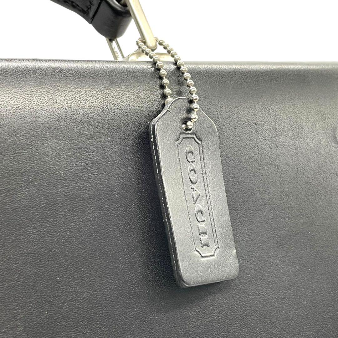 コーチ ビジネスバッグ レザー ブラック A4収納 ブリーフケース フラップ ハンドバッグ トートバッグ 大容量 シルバー金具 チャーム付き COACH E