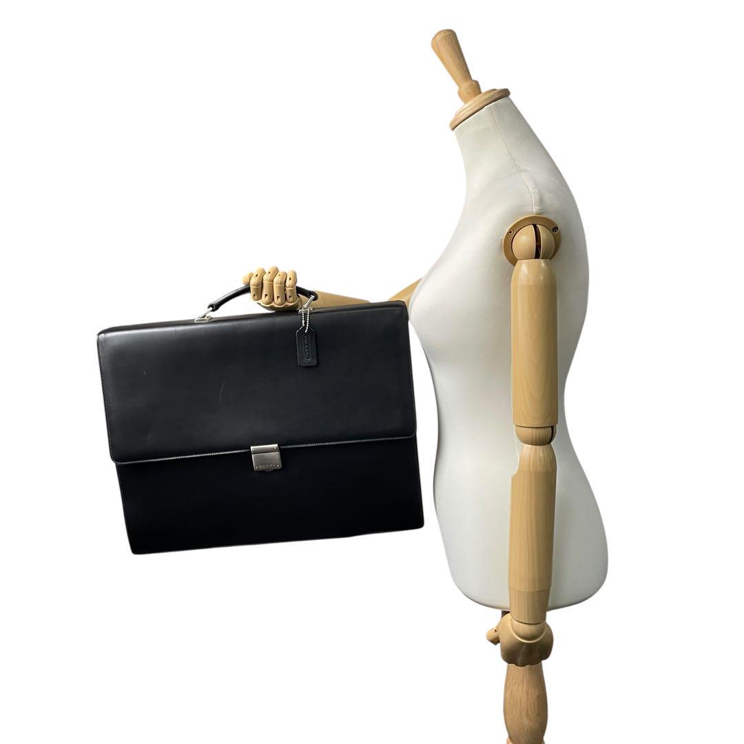 コーチ ビジネスバッグ レザー ブラック A4収納 ブリーフケース フラップ ハンドバッグ トートバッグ 大容量 シルバー金具 チャーム付き COACH E