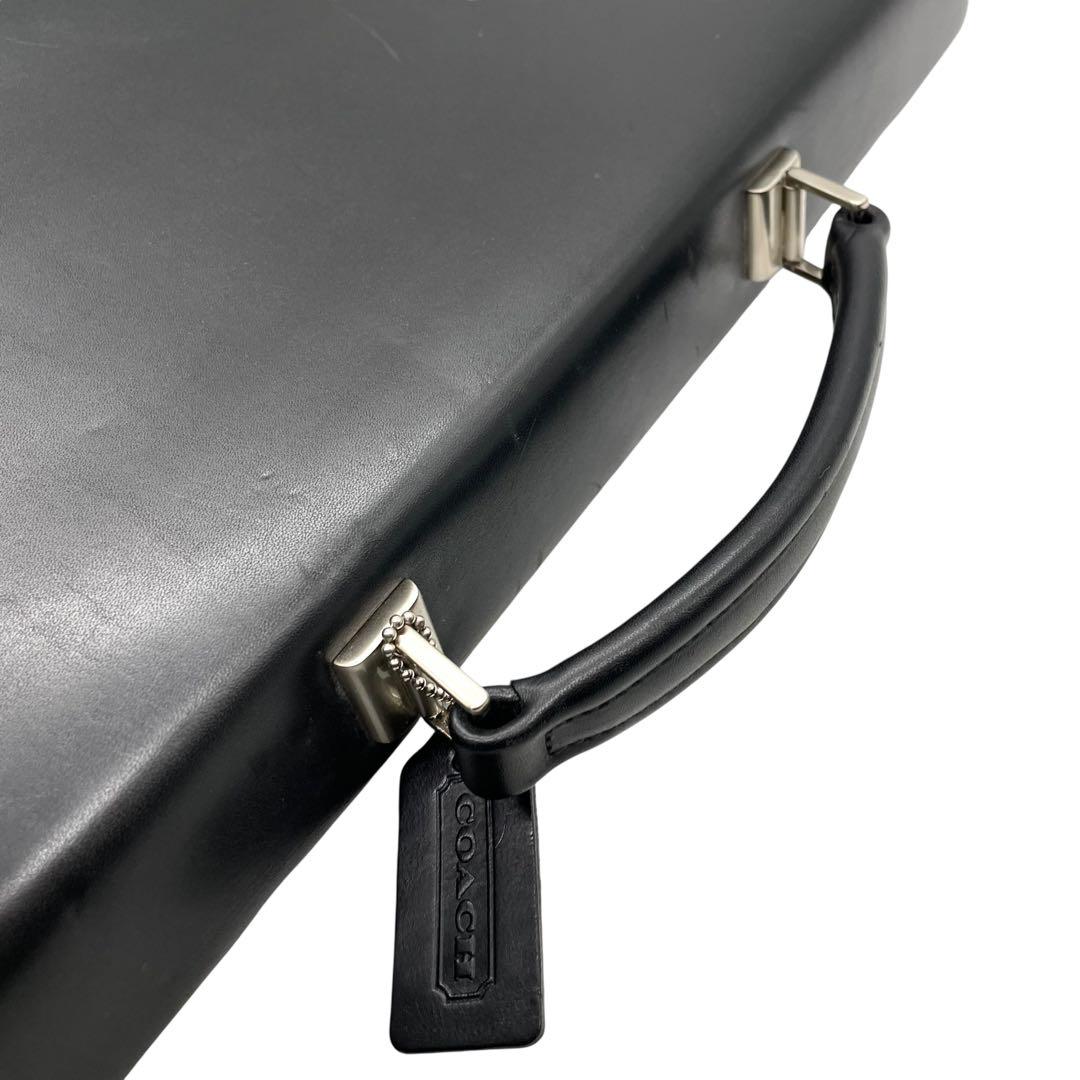 コーチ ビジネスバッグ レザー ブラック A4収納 ブリーフケース フラップ ハンドバッグ トートバッグ 大容量 シルバー金具 チャーム付き COACH E