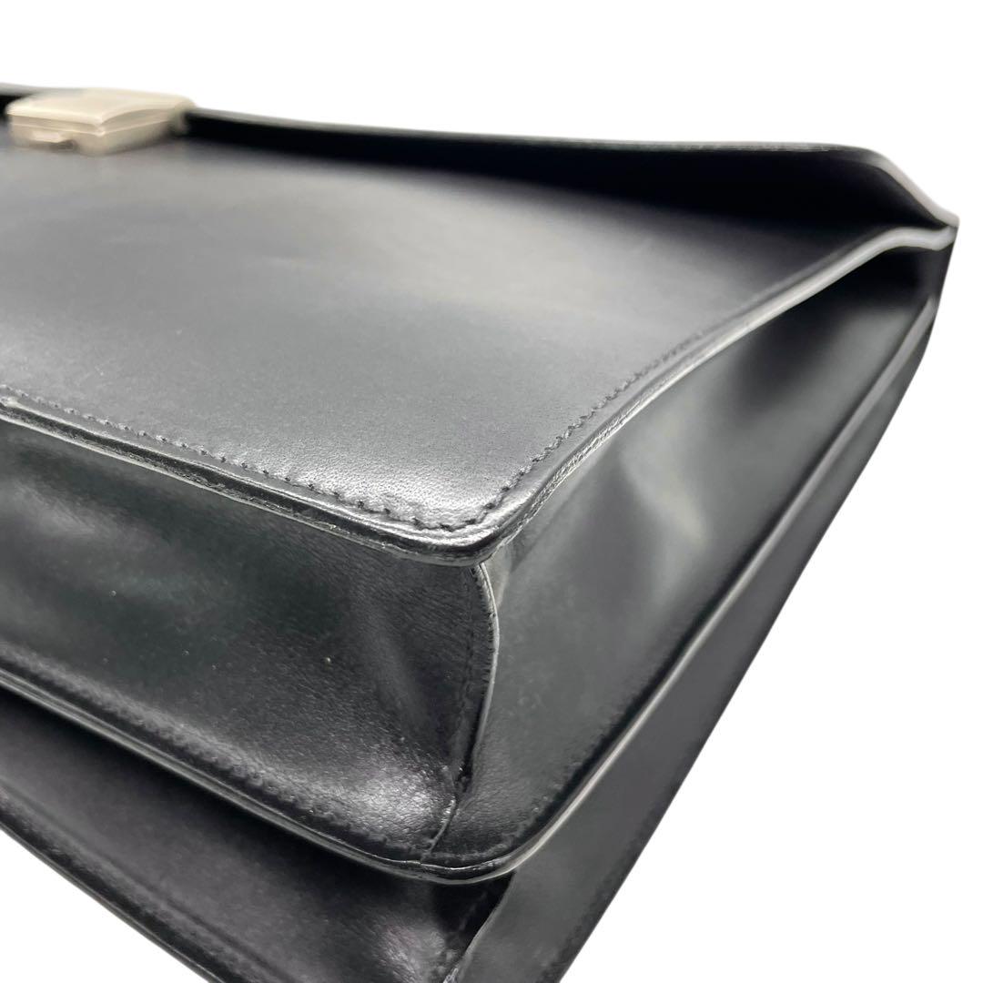 コーチ ビジネスバッグ レザー ブラック A4収納 ブリーフケース フラップ ハンドバッグ トートバッグ 大容量 シルバー金具 チャーム付き COACH E