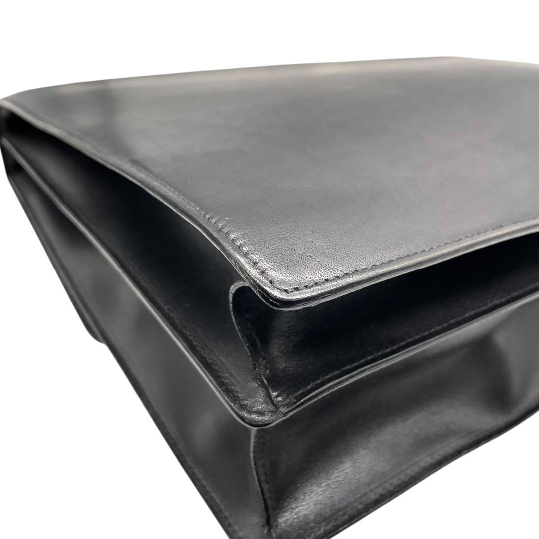 コーチ ビジネスバッグ レザー ブラック A4収納 ブリーフケース フラップ ハンドバッグ トートバッグ 大容量 シルバー金具 チャーム付き COACH E