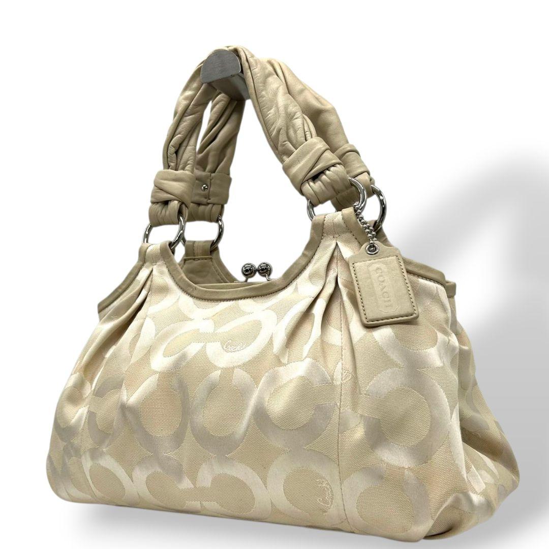 コーチ ハンドバッグ 白 ホワイト オプアート マディソン がま口 ワンショルダー トートバッグ 肩掛け可 キャンバス レザー 本革 ベージュ シルバー金具 ロゴタグ s70 COACH