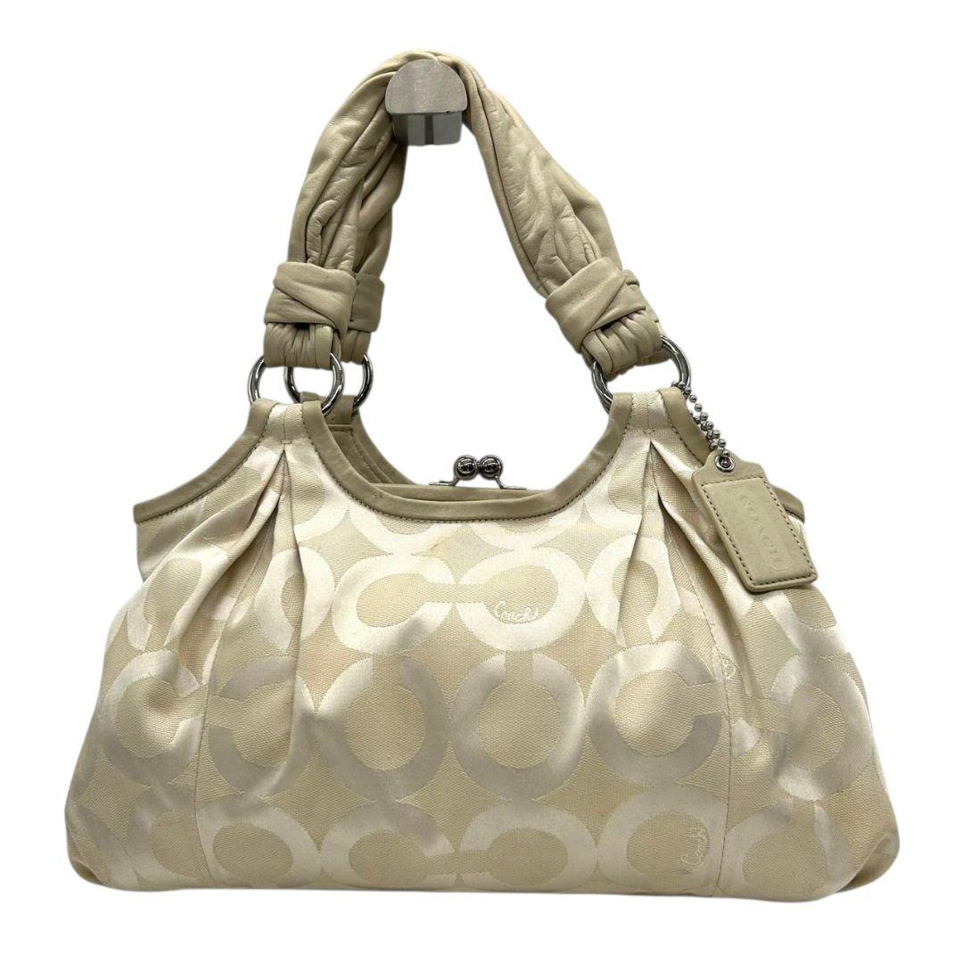 コーチ ハンドバッグ 白 ホワイト オプアート マディソン がま口 ワンショルダー トートバッグ 肩掛け可 キャンバス レザー 本革 ベージュ シルバー金具 ロゴタグ s70 COACH