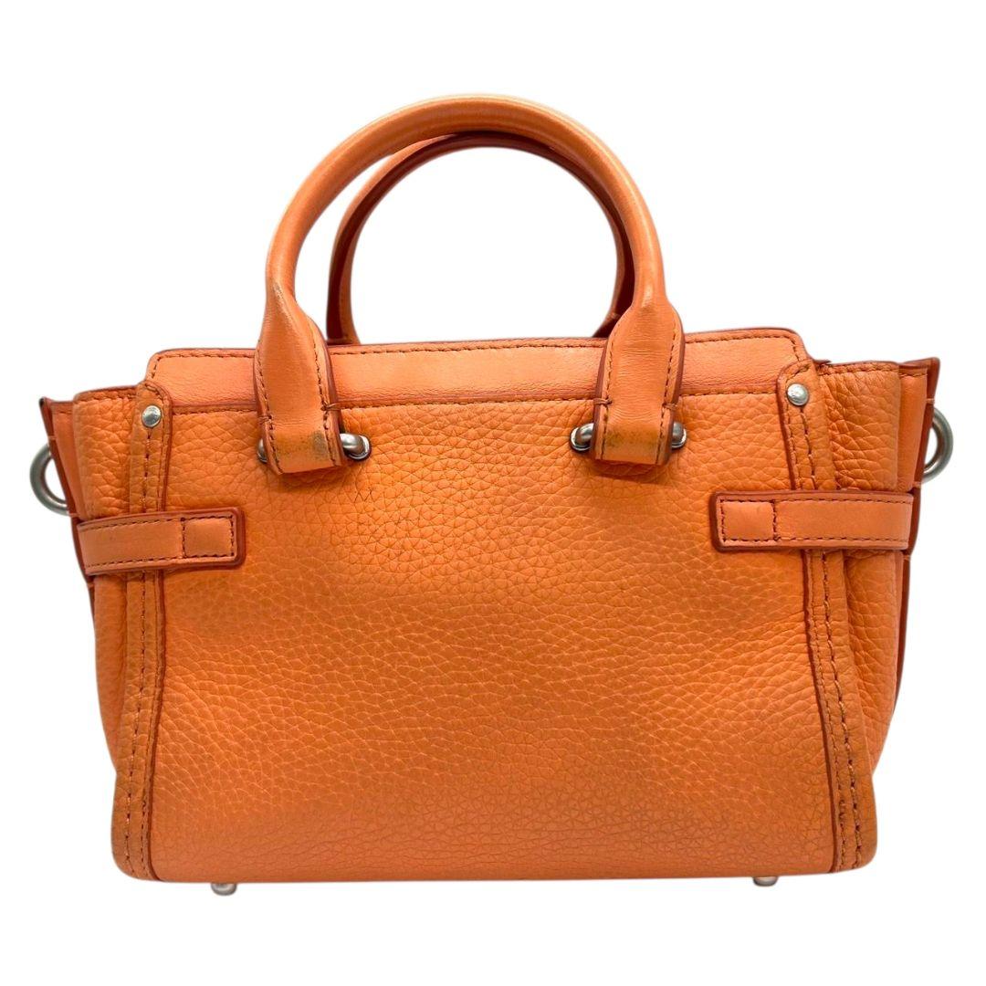 コーチ ハンドバッグ オレンジ スワッガー 2way レザー 本革 斜め掛け可 自立可 ショルダーバッグ トートバッグ シルバー金具 ロゴタグ s35 35798 COACH 上品 高級感