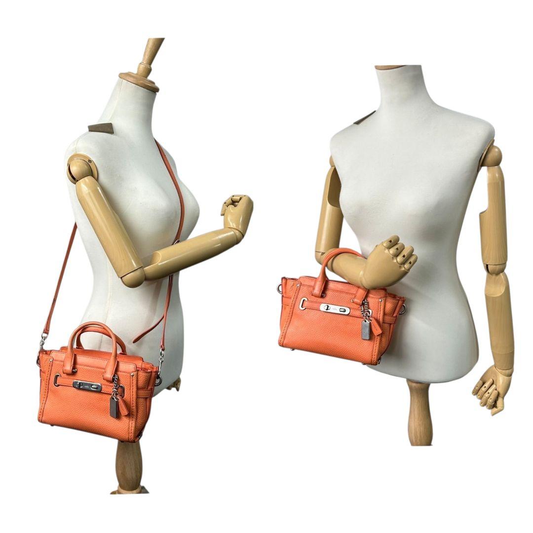 コーチ ハンドバッグ オレンジ スワッガー 2way レザー 本革 斜め掛け可 自立可 ショルダーバッグ トートバッグ シルバー金具 ロゴタグ s35 35798 COACH 上品 高級感