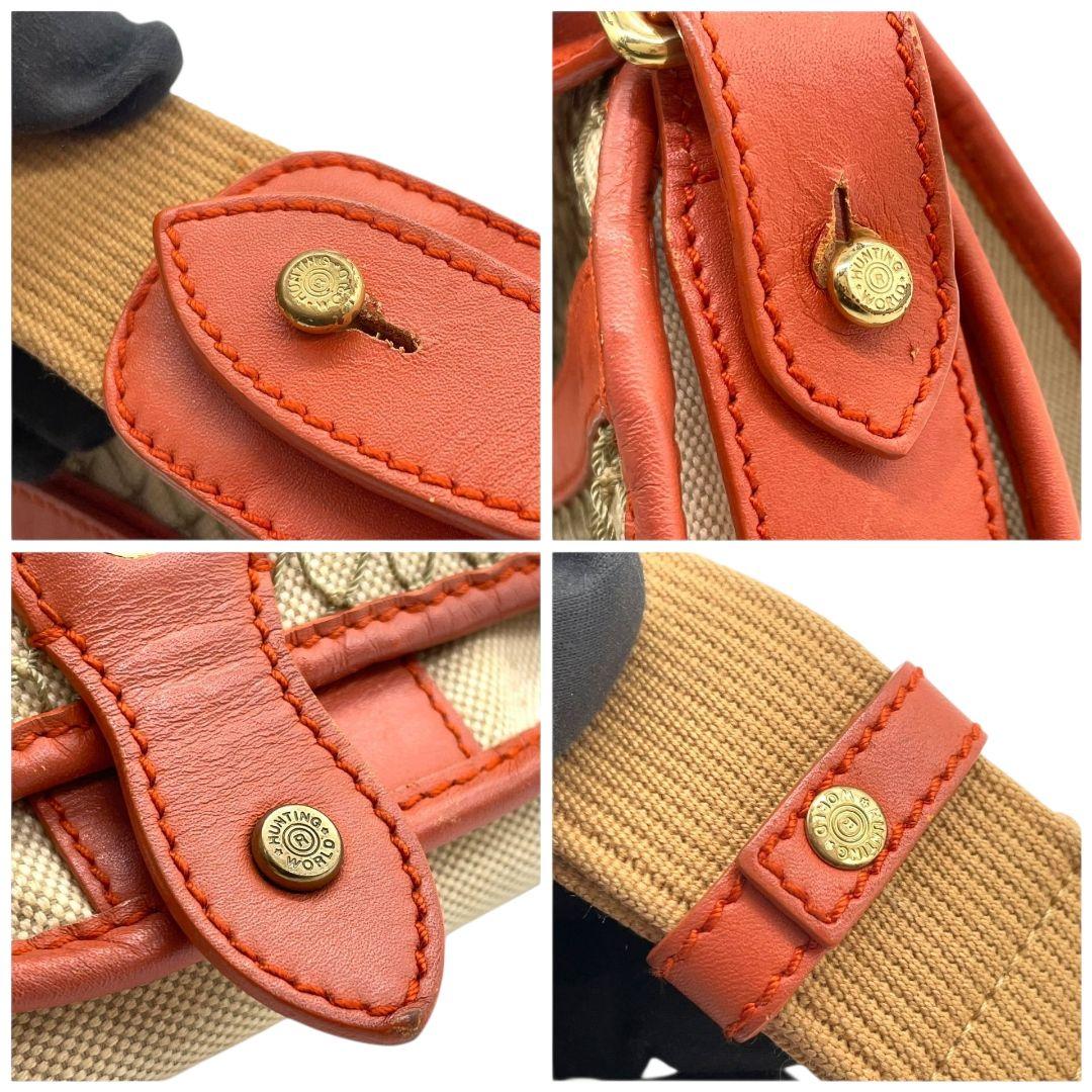 国内タイトルハンティングワールド ショルダーバッグ ベージュ レッド フラップ キャンバス レザー 斜め掛け可 ゴールド金具 ロゴ 本革 オレンジ 肩掛け可 HUNTING WORLD
