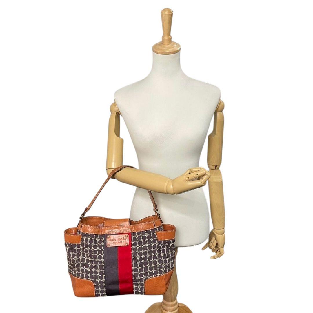 ケイトスペード kate spade ハンドバッグ 茶 ブラウン 総柄 A4収納 ワンショルダー トートバッグ キャンバス レザー 本革 肩掛け可 ロゴプレート T1 レディース