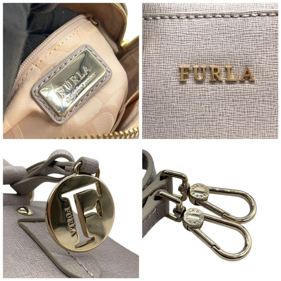 フルラ ハンドバッグ グレー グレージュ 2way ショルダーバッグ 斜め掛け可 トートバッグ レザー 本革 ゴールド金具 ロゴ チャーム付き FURLA 上品 おしゃれ 通勤 通学