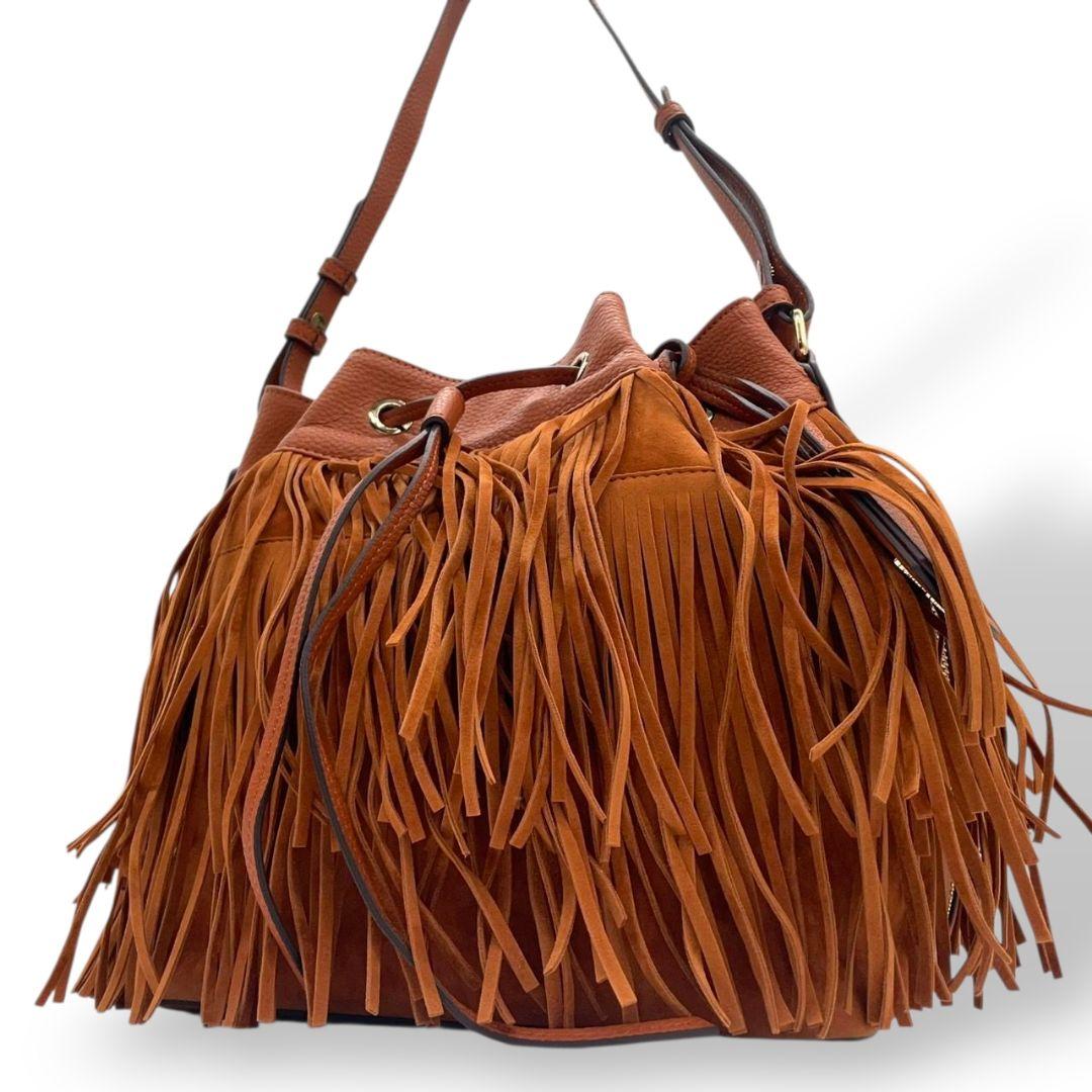 サマンサベガ ショルダーバッグ オレンジ ブラウン 茶 フリンジ 巾着 斜め掛け可 スウェード レザー 本革 ゴールド金具 チャーム付き ロゴ s16 Samantha Vega