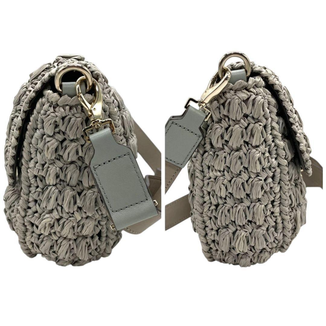 アニヤハインドマーチ ANYA HINDMARCH ショルダーバッグ グレージュ 灰 カゴ 編み込み リボン フラップ 斜め掛け可 自立可 ゴールド金具 ターンロック s81