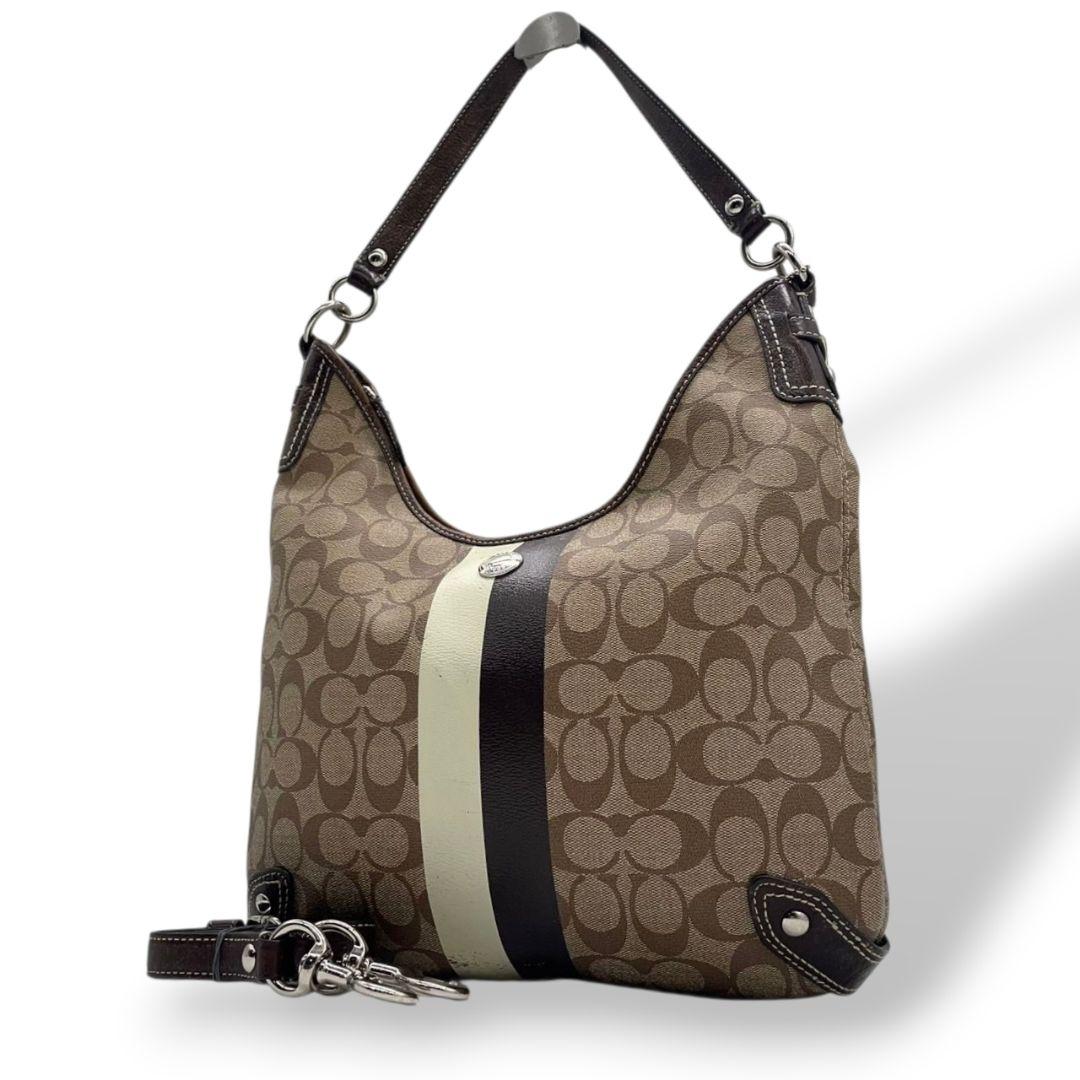 コーチ　ショルダーバッグ　茶　シグネチャー　ストライプ　PVC　2way　s9　A4収納　斜め掛け可　トートバッグ　ハンドバッグ　ワンショルダー　ブラウン　シルバー金具　ロゴプレート　レザー　本革　COACH　F14476