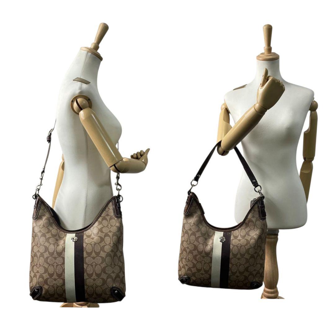 コーチ　ショルダーバッグ　茶　シグネチャー　ストライプ　PVC　2way　s9　A4収納　斜め掛け可　トートバッグ　ハンドバッグ　ワンショルダー　ブラウン　シルバー金具　ロゴプレート　レザー　本革　COACH　F14476