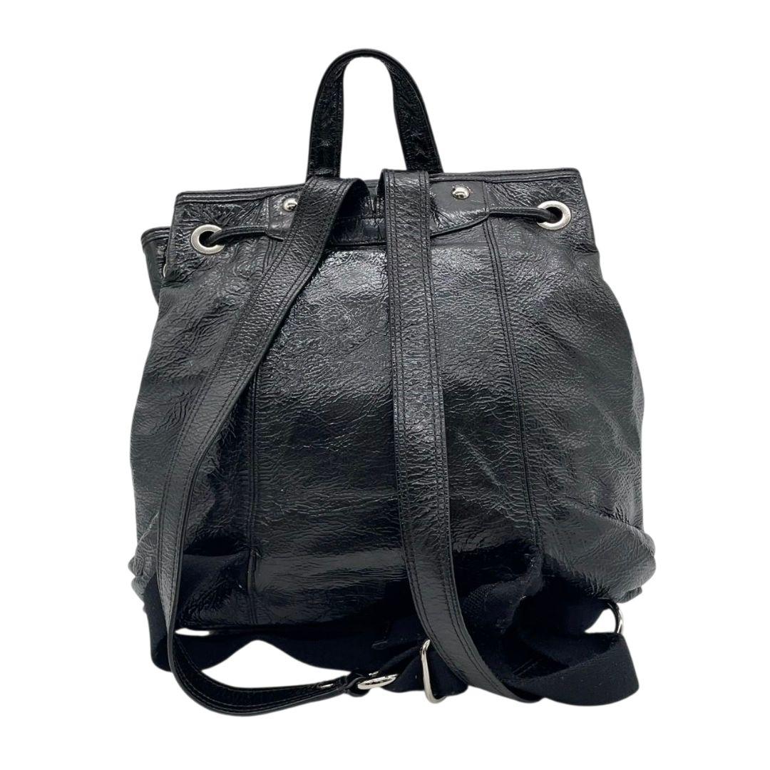 コーチ バックパック 黒 フラップ ターンロック パテントレザー s3 リュック A4収納 ブラック チャーム付き シルバー金具 エナメル 本革 COACH 17949