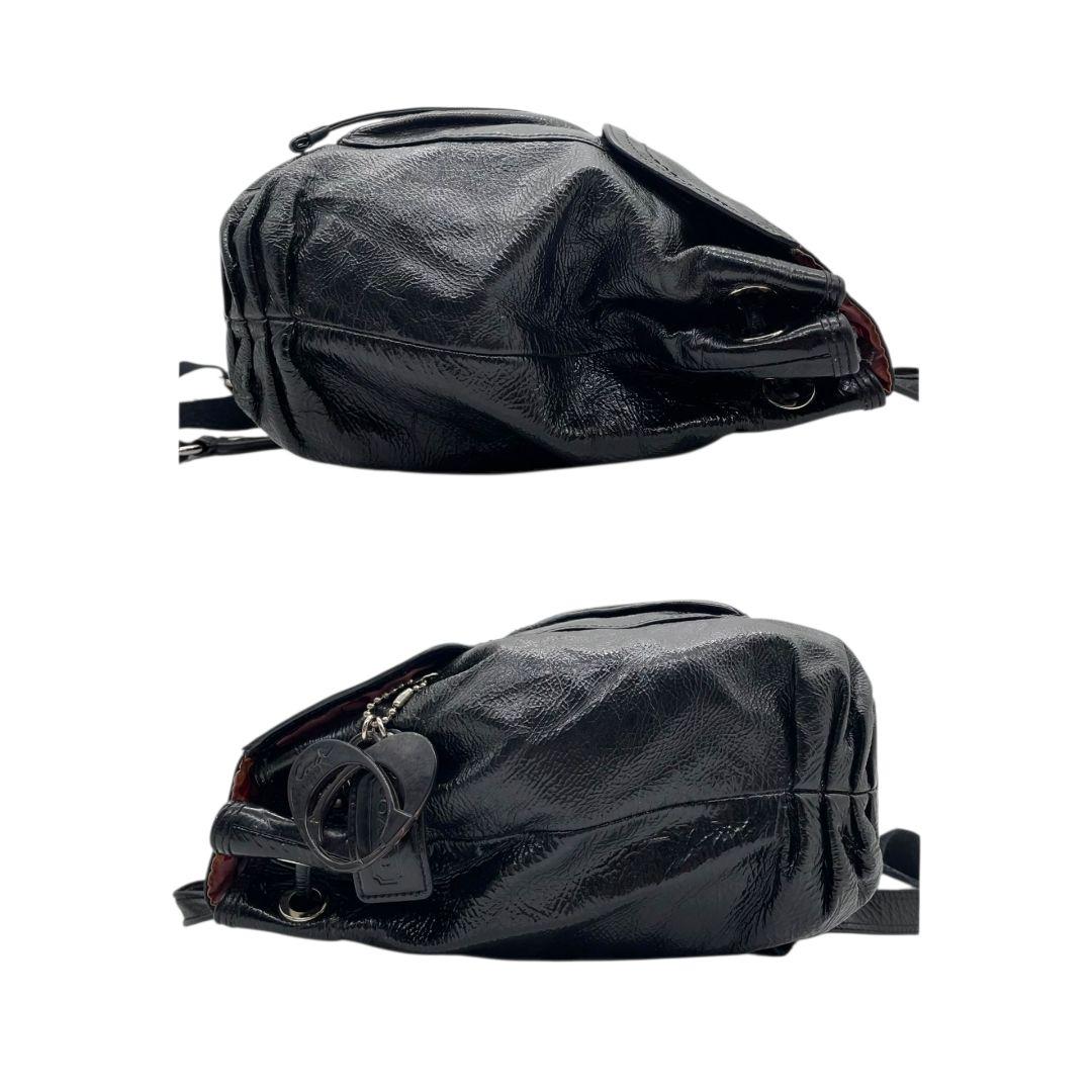 コーチ バックパック 黒 フラップ ターンロック パテントレザー s3 リュック A4収納 ブラック チャーム付き シルバー金具 エナメル 本革 COACH 17949