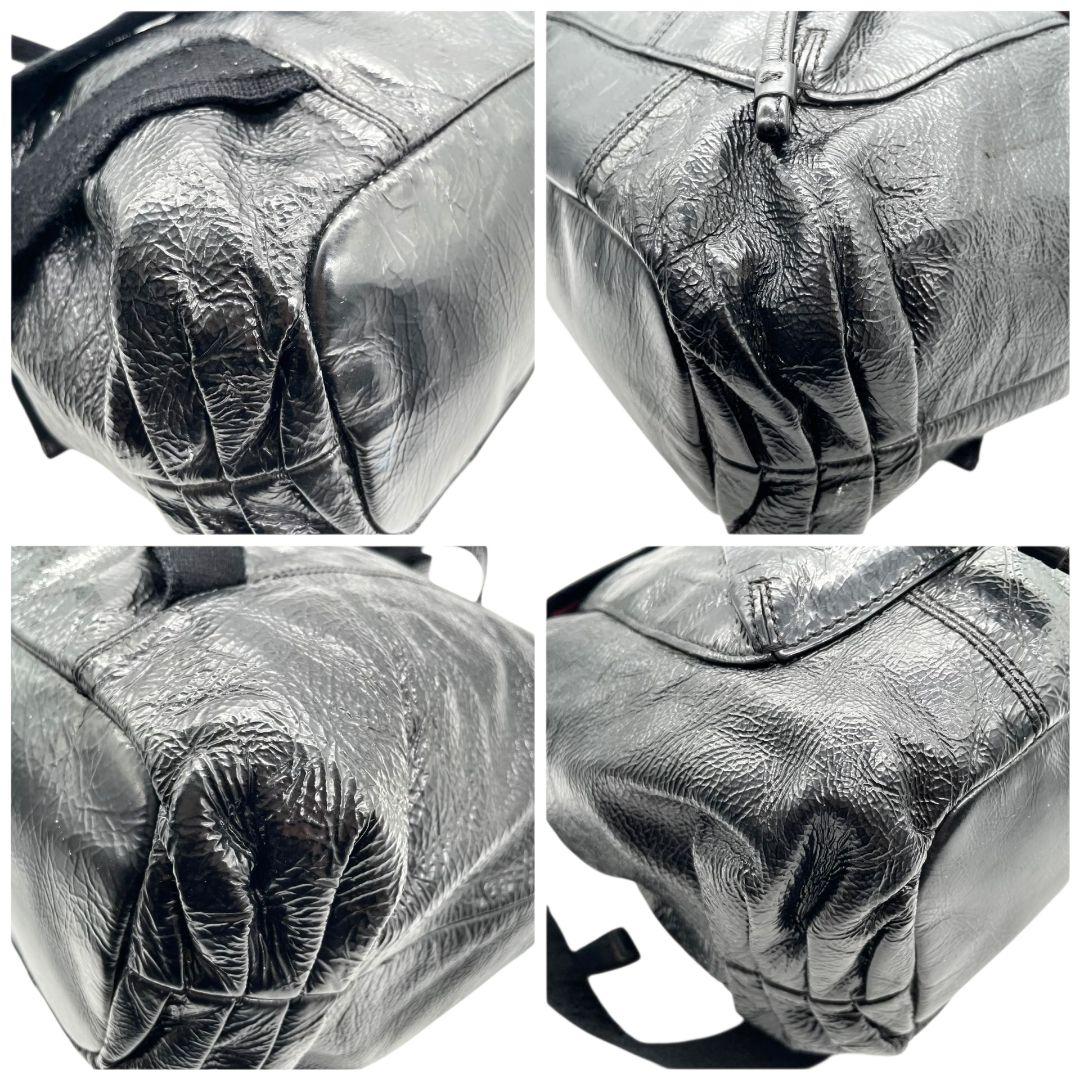 コーチ バックパック 黒 フラップ ターンロック パテントレザー s3 リュック A4収納 ブラック チャーム付き シルバー金具 エナメル 本革 COACH 17949