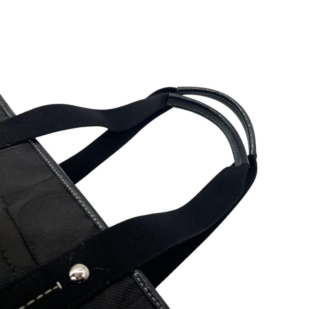 コーチ ハンドバッグ 2way 黒 シグネチャー キャンバス S20 ブラック トートバッグ ショルダーバッグ 斜め掛け可 ワンショルダー ロゴチャーム A4収納 シルバー金具 COACH オシャレ