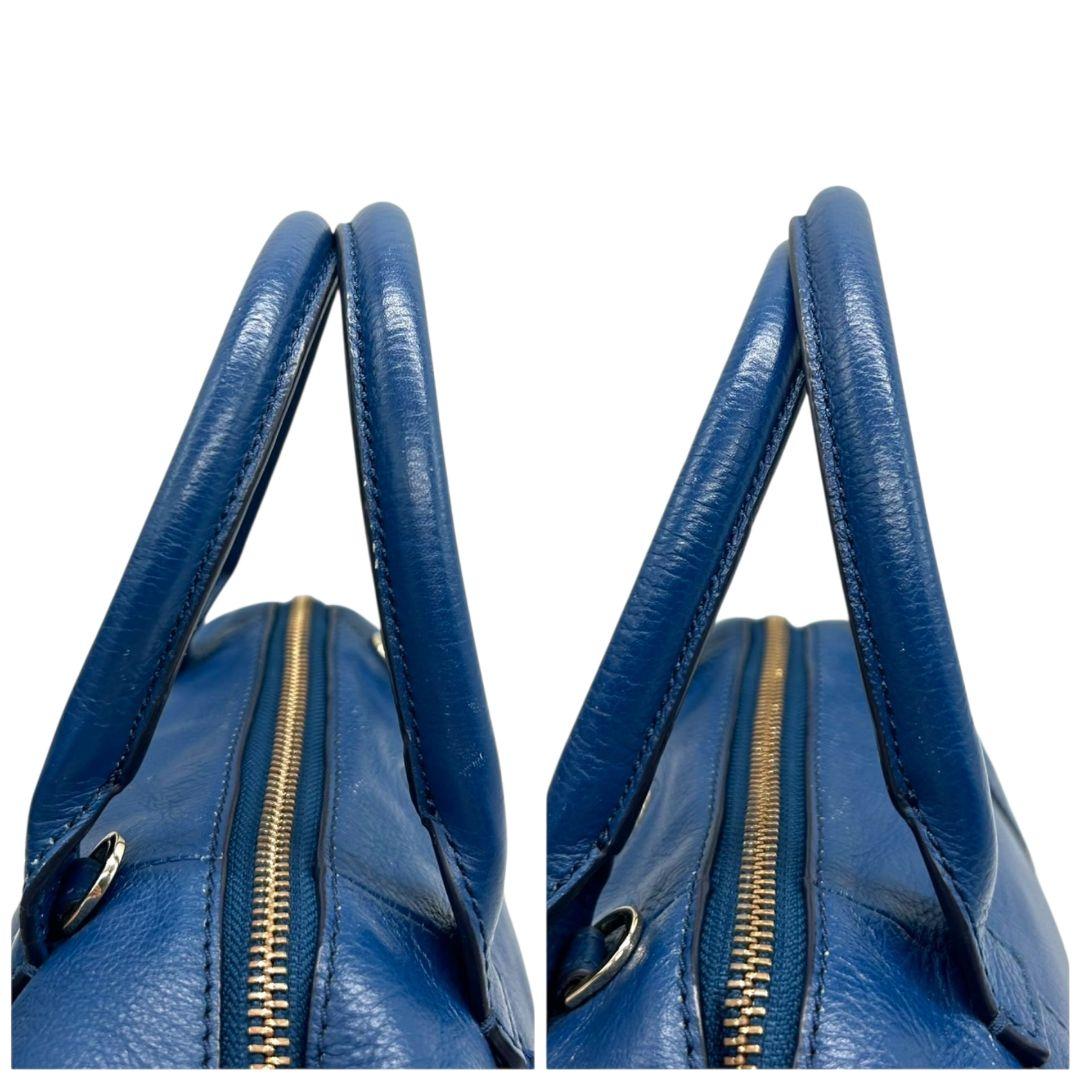 トリーバーチ ハンドバッグ 青 ロゴ 2way 斜め掛け可 レザー 本革 自立可 ショルダーバッグ トートバッグ ドーム型 ブルー ゴールド金具 ロゴプレート TORY BURCH E5 上品 高級感