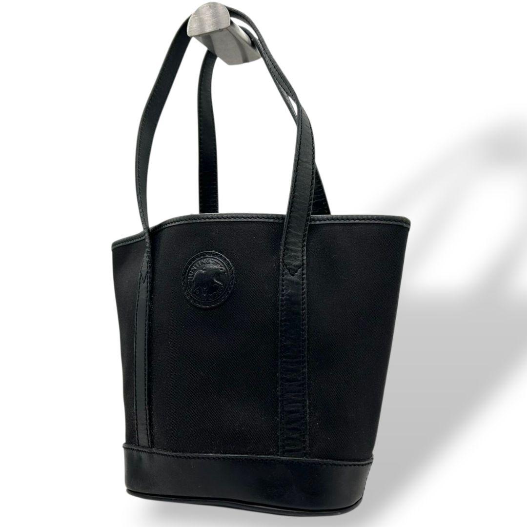 ハンティングワールド HUNTING WORLD トートバッグ ハンドバッグ 黒 ブラック ロゴ ワンショルダー 自立可 肩掛け可 キャンバス レザー ロゴプレート s92 レディース