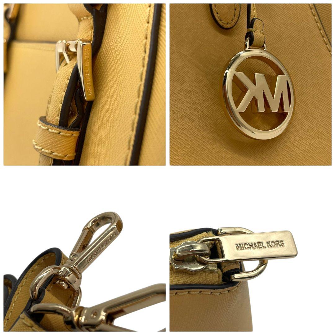 美品　マイケルコース　ハンドバッグ　黄　ロゴ　2way　斜め掛け可　レザー　u10　本革　トートバッグ　ショルダーバッグ　イエロー　ゴールド金具　ロゴプレート　ロゴチャーム　MICHAEL KORS