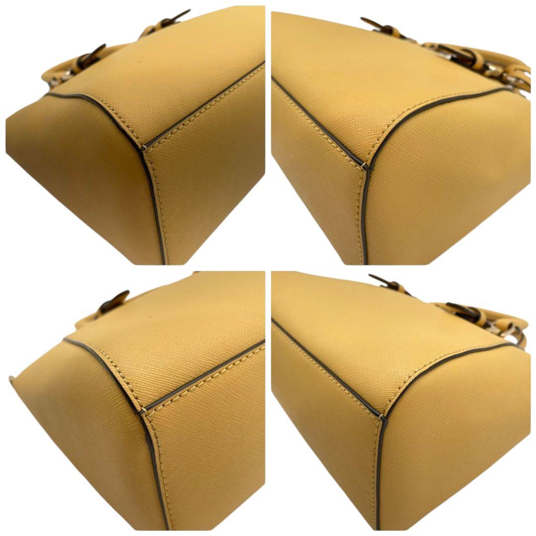 美品　マイケルコース　ハンドバッグ　黄　ロゴ　2way　斜め掛け可　レザー　u10　本革　トートバッグ　ショルダーバッグ　イエロー　ゴールド金具　ロゴプレート　ロゴチャーム　MICHAEL KORS