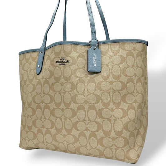 コーチ トートバッグ ベージュ シグネチャー A4収納 PVC ワンショルダー ハンドバッグ 自立可 肩掛け可 肩かけ可 リバーシブル シティ ロゴタグ ロゴ シルバー金具 ブルー T2 COACH 上品 高級感