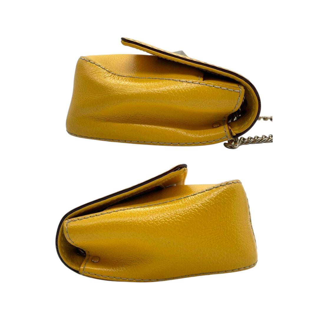 ケイトスペード ショルダーバッグ 黄 チェーン フラップ ターンロック 本革 s11 レザー イエロー シルバー金具 ロゴプレート kate spade