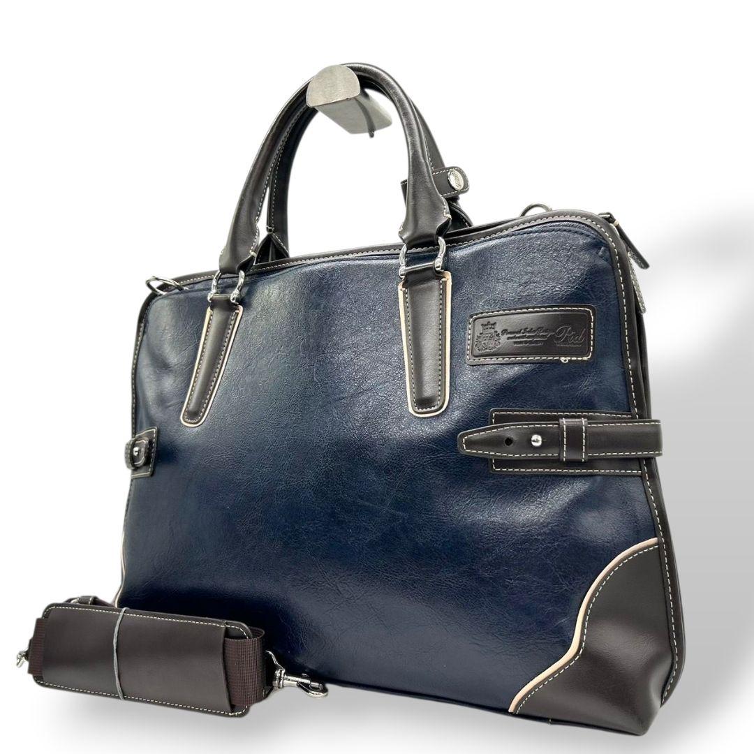 美品 ピーアイディー ビジネスバッグ 紺 ネイビー ブラウン 茶 レザー 本革 2way トートバッグ ハンドバッグ ショルダーバッグ A4収納 自立可 斜め掛け可 ロゴプレート シルバー金具 Pid x