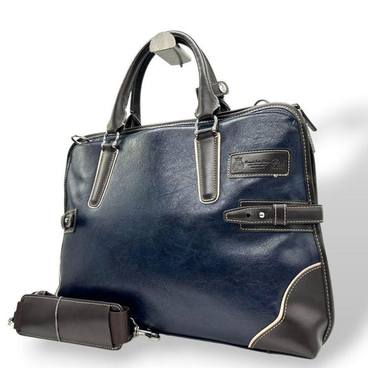 美品 ピーアイディー ビジネスバッグ 紺 ネイビー ブラウン 茶 レザー 本革 2way トートバッグ ハンドバッグ ショルダーバッグ A4収納 自立可 斜め掛け可 ロゴプレート シルバー金具 Pid x