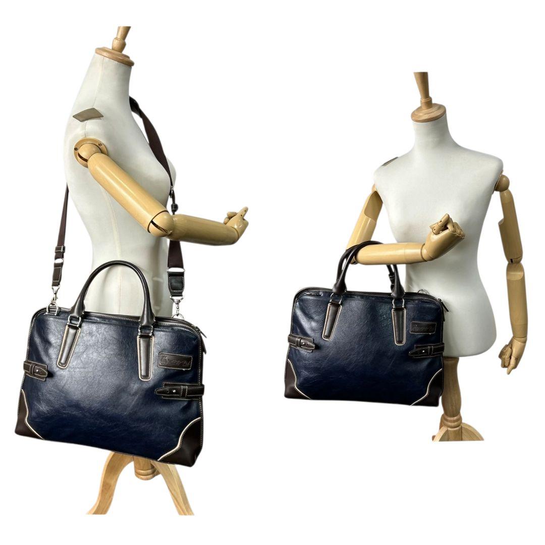 美品 ピーアイディー ビジネスバッグ 紺 ネイビー ブラウン 茶 レザー 本革 2way トートバッグ ハンドバッグ ショルダーバッグ A4収納 自立可 斜め掛け可 ロゴプレート シルバー金具 Pid x